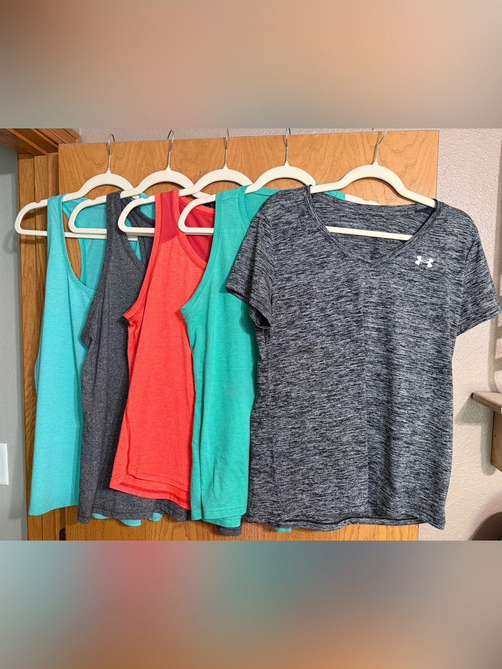 Lot of Women’s workout tops - UnderArmour, Nike, Reebok